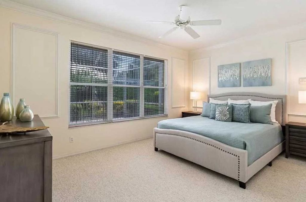 Timmaron Way master bedroom staged by Naples Home Staging | Home Staging Services Southwest Florida